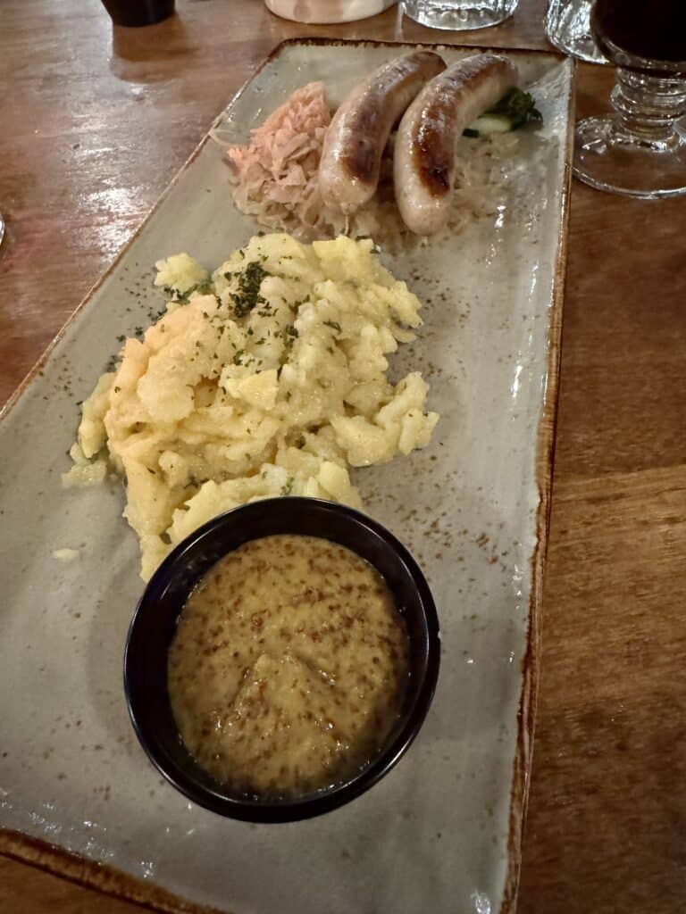 N&uuml;rnberger Bratwurst with German Potato Salad and Sauerkraut