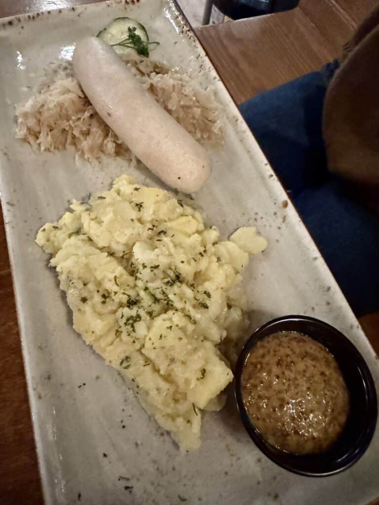 Weisswurst with German Potato Salad and Sauerkraut