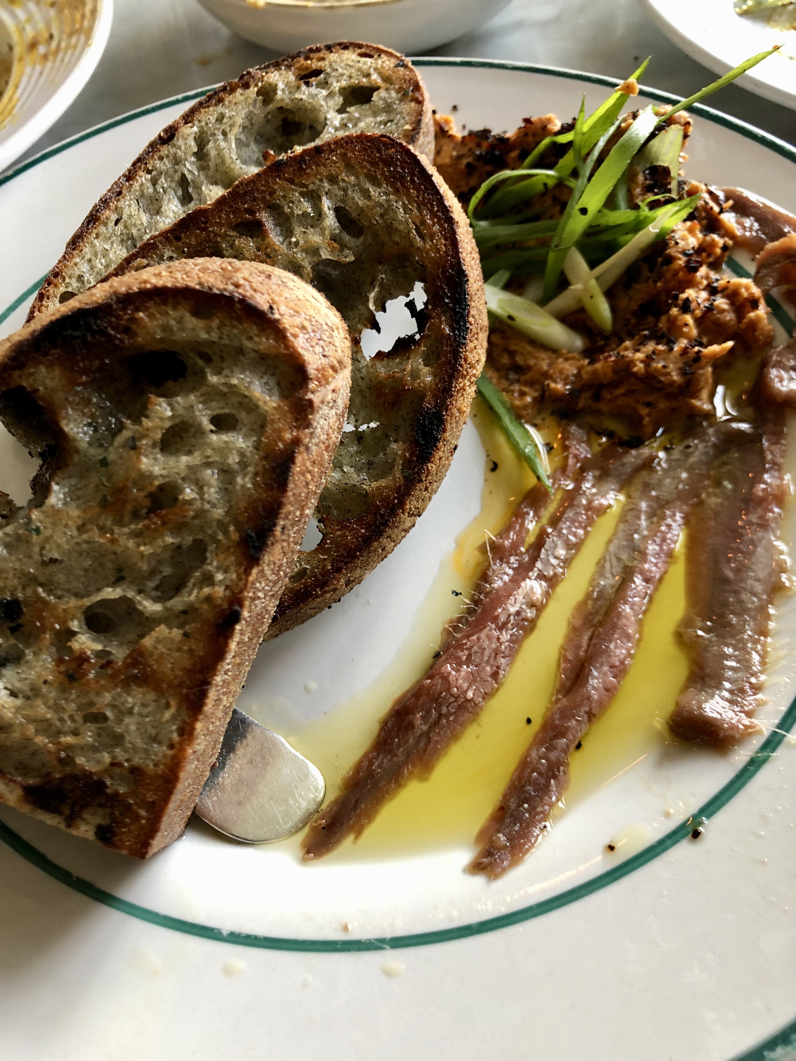 Anchovies with Harissa Butter
