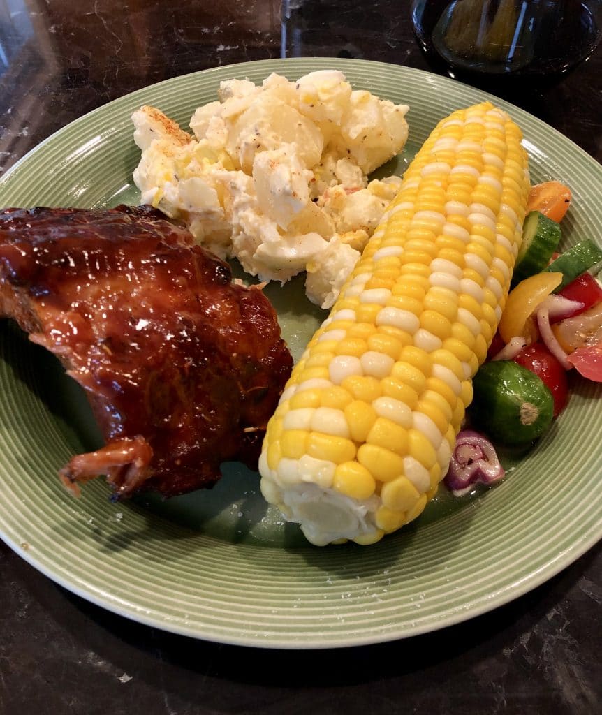 Ribs, Corn, Potato Salad and Cucumber Tomato Salad