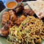 Center Himalayan Noodles, Clockwise: momos, pikora and Naan